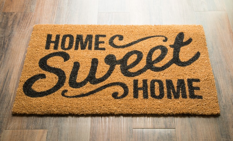 home sweet home welcome mat on floor picture
