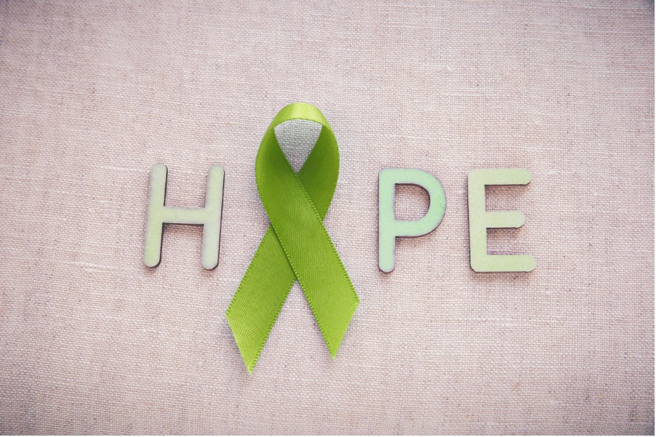 Hope spelled out with a green ribbon as the o