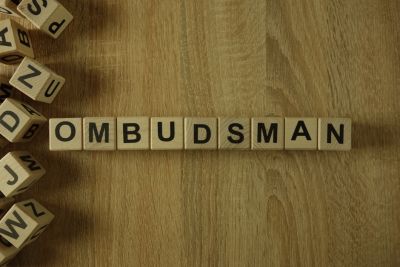Image of wooden blocks spelling out the word Ombudsman.